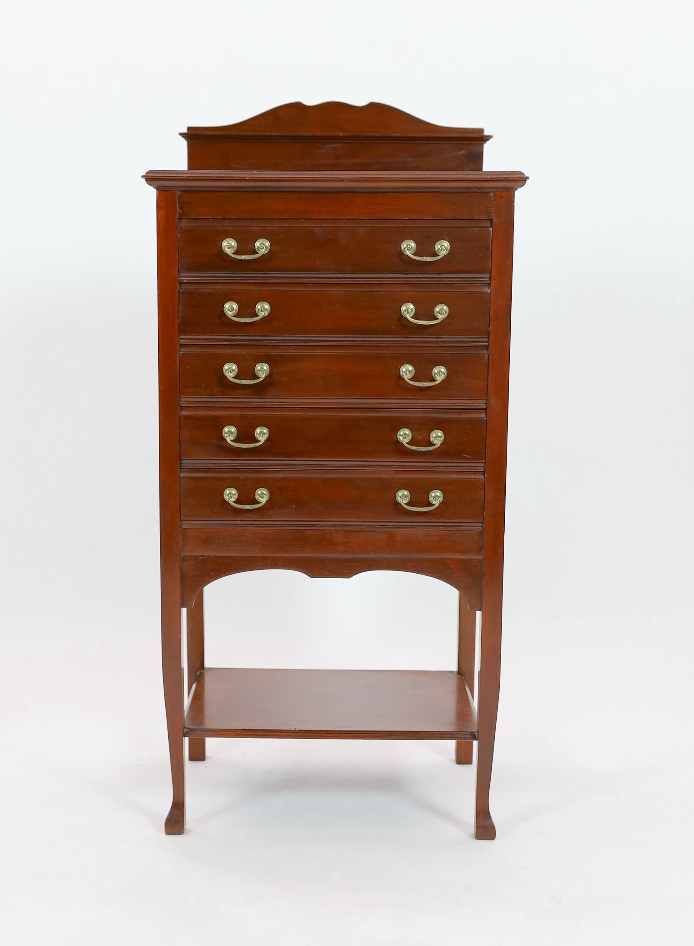 An Edwardian mahogany five drawer music cabinet, width 52cm depth 38cm height 108cm